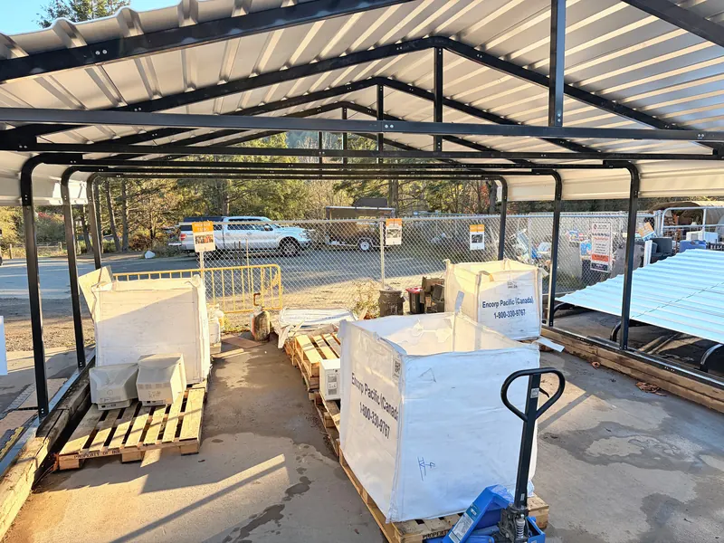 Covered recycling area at the transfer station with Encorp Pacific collection bags